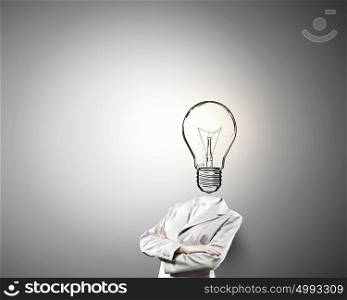 Head full of ideas. Unrecognizable businesswoman with light bulb instead of head