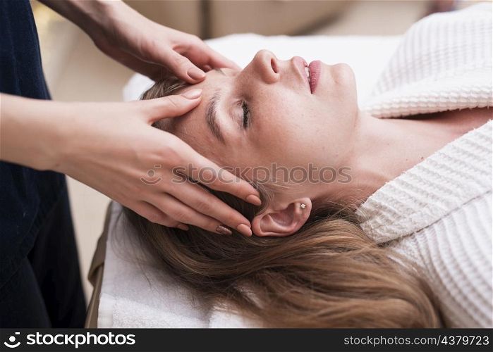 head massage relaxed woman spa