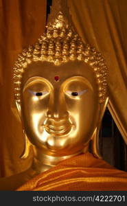 Head of golden buddha in wat, Thailand