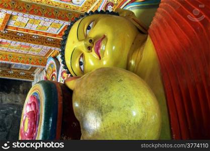 Head of sleeping Buddha in Isurumuniya rock temple in Anuradhapura