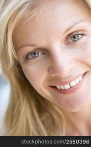 Head shot of woman smiling