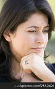 Head shot of worried woman