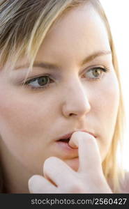 Head shot of worried woman