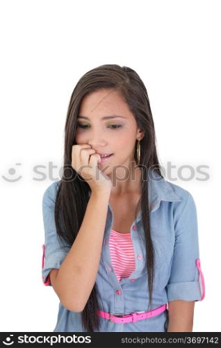 Head shot of worried woman over white background