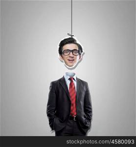 Headless businessman . Funny businessman and his head hanging on rope