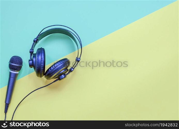 Headphone on a yellow and blue background