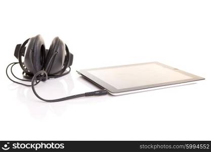 Headphones connected to a last generation tablet computer