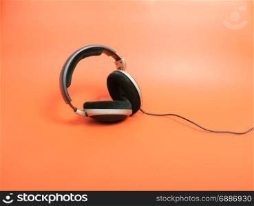 headphones on red background
