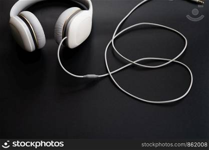 Headphones white isolated on a black background