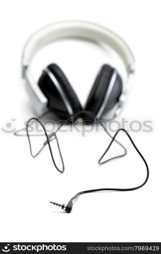 Headphones with wire. Limited depth of field. Isolate on white.