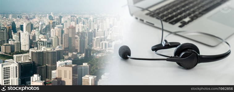 Headset and customer support equipment at call center ready for actively service . Corporate business help desk and telephone assistance concept .. Headset and customer support equipment at call center ready for actively service