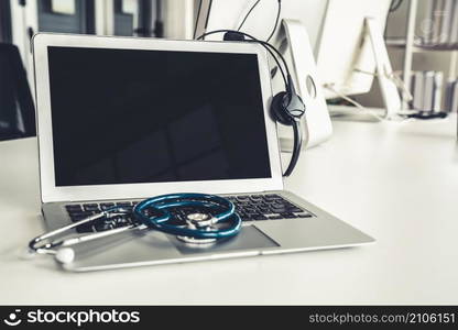 Headset and doctor equipment at clinic ready for actively support for patient by online video call . Concept of telehealth and telemedicine service .. Headset and doctor equipment at clinic ready for actively support for patient