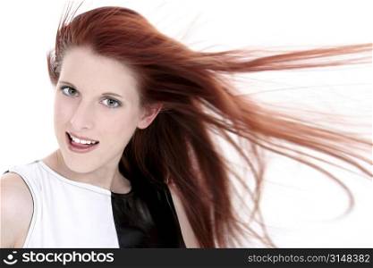 Headshot of a beautiful young woman with long red hair and hazel eyes.