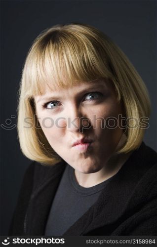 Headshot of negative young girl with fringe