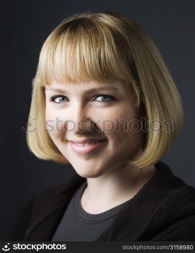 Headshot of young girl smiling with fringe