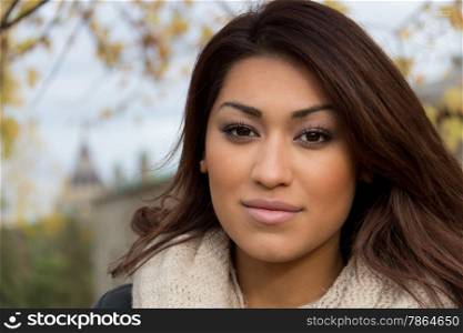 Headshot portrait of an attractive, fresh latino woman