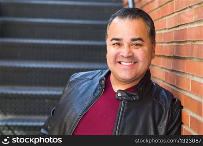 Headshot Portrait of Handsom Hispanic Man.