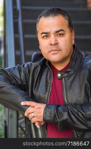 Headshot Portrait of Handsom Hispanic Man.