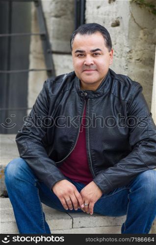 Headshot Portrait of Handsom Hispanic Man.