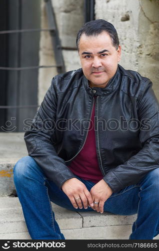 Headshot Portrait of Handsom Hispanic Man.