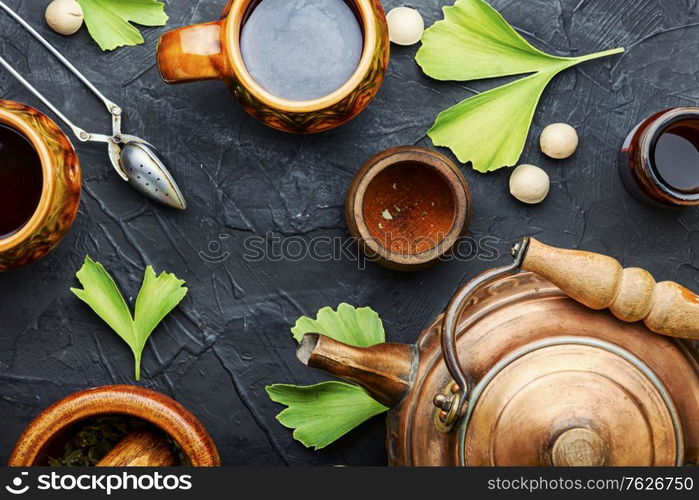 Healing herbal tea from the leaves and seeds of ginkgo biloba.Medical plants.Herbal medicine. Ginkgo biloba in herbal medicine