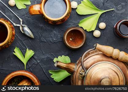 Healing herbal tea from the leaves and seeds of ginkgo biloba.Medical plants.Herbal medicine. Ginkgo biloba in herbal medicine