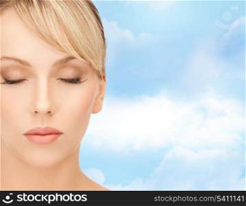 healt, spa and beauty concept - face of beautiful woman with blonde hair