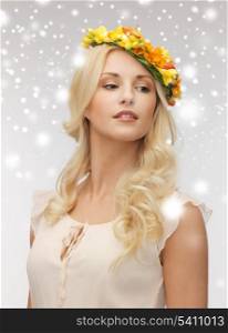 health and beauty, bridal concept - young woman wearing wreath of flowers