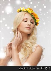 health and beauty, bridal concept - young woman wearing wreath of flowers
