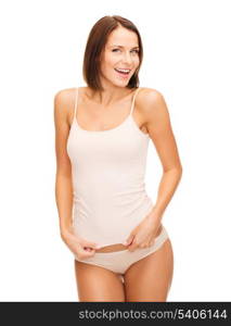 health and beauty concept - beautiful woman in beige cotton underwear