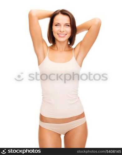 health and beauty concept - beautiful woman in beige cotton underwear