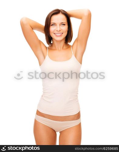health and beauty concept - beautiful woman in beige cotton underwear. beautiful woman in beige cotton underwear