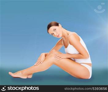 health and beauty concept - beautiful woman in white cotton underwear