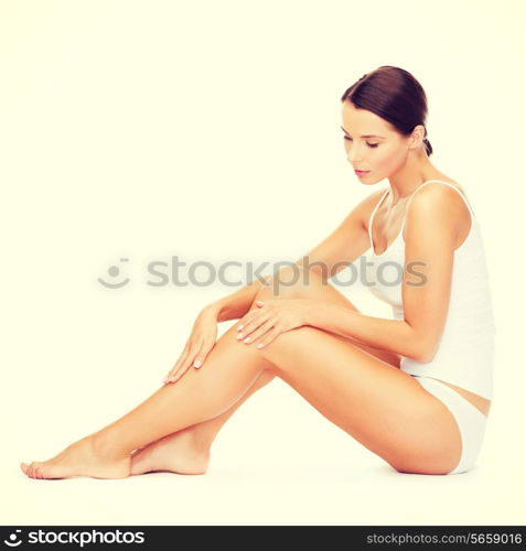 health and beauty concept - beautiful woman in white cotton underwear