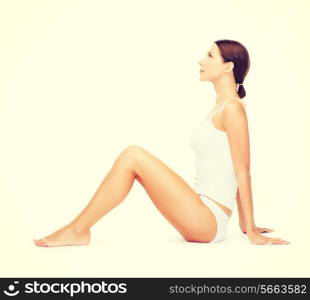 health and beauty concept - beautiful woman in white cotton underwear