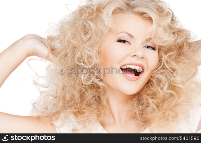 health and beauty concept - beautiful woman with long curly hair