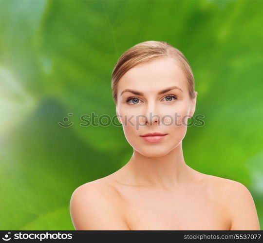 health and beauty concept - clean face of beautiful young woman