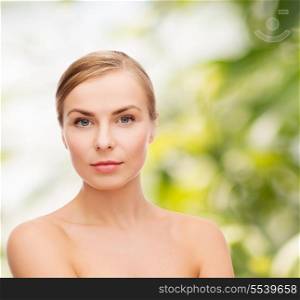 health and beauty concept - clean face of beautiful young woman