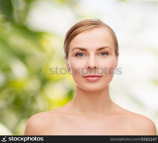 health and beauty concept - clean face of beautiful young woman
