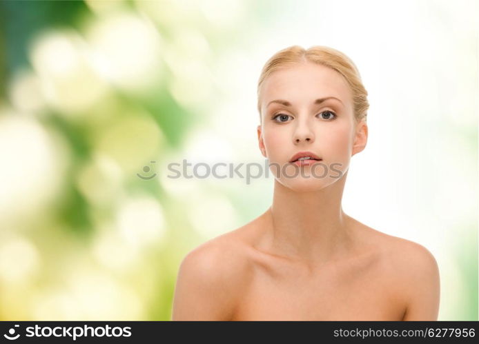 health and beauty concept - clean face of beautiful young woman