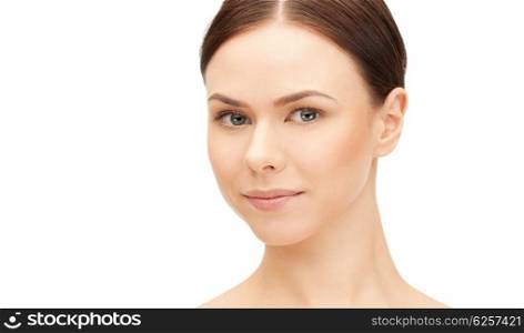 health and beauty concept - clean face of beautiful young woman. young woman