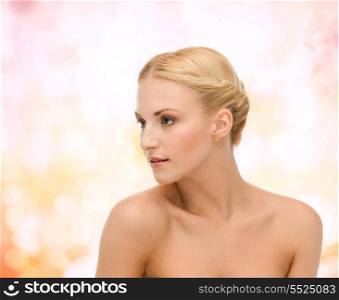 health and beauty concept - close up of clean face of beautiful young woman
