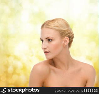 health and beauty concept - close up of clean face of beautiful young woman