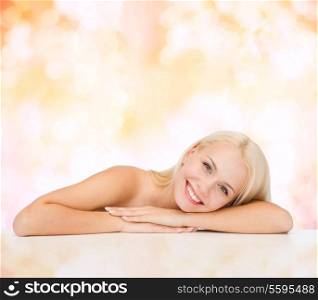 health and beauty concept - closeup of clean face and shoulders of beautiful young woman
