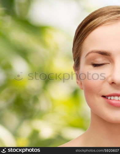 health and beauty concept - closeup of face of beautiful young woman with closed eyes. face of beautiful woman with closed eyes