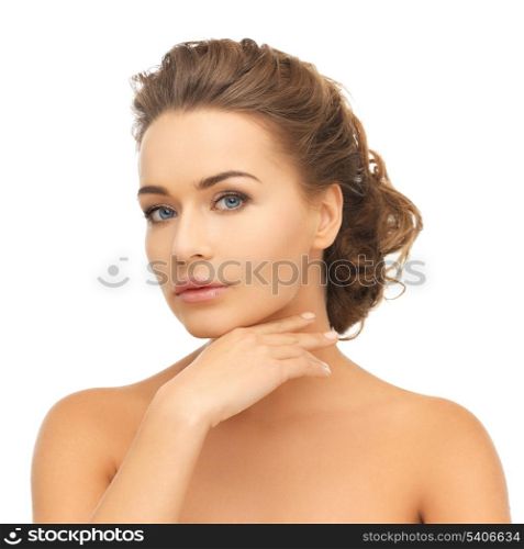 health and beauty concept - face and hands of beautiful woman with updo (can be used as a template for jewelry)