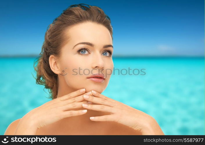 health and beauty concept - face and hands of beautiful woman with updo, can be used as a template for jewelry