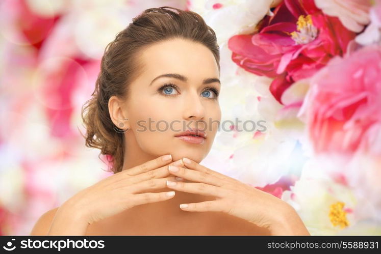 health and beauty concept - face and hands of beautiful woman with updo, can be used as a template for jewelry