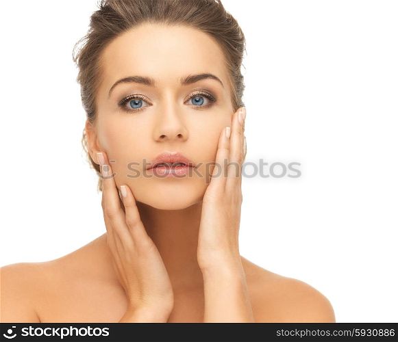 health and beauty concept - face and hands of beautiful woman with updo (can be used as a template for jewelry). beautiful woman with long hair