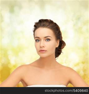 health and beauty concept - face of beautiful bride with evening updo